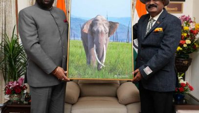 Chief Conservator of Forests, Uttarakhand, Shri Sameer Sinha, paying a courtesy visit to the Governor and presenting him a picture of an elephant.