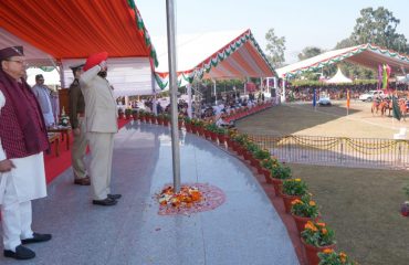 Governor taking salute of the parade after hoisting the national flag at Parade Ground on the occasion of 75th anniversary of Republic Day.