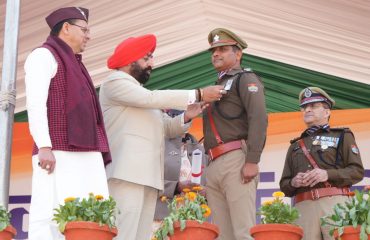 Governor felicitating police officers for outstanding service on the occasion of 75th anniversary of Republic Day.