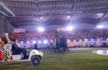 Prime Minister Shri Narendra Modi along with Chief Minister Shri Pushkar Singh Dhami accepting the greetings of the people present at the inauguration program of the 38th National Games.