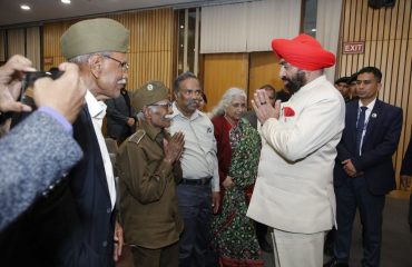 Governor interacting with people at the book release of “Beyond Fear: A Personalf Journey to Soma” in New Delhi.