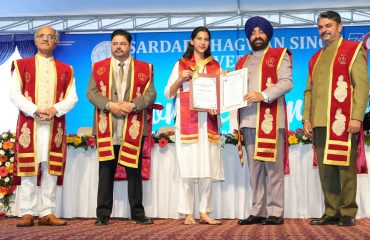 Governor awarding degrees and medals to students at the first convocation of Sardar Bhagwan Singh University, Dehradun.