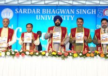 Governor releasing the Annual Report 2023-24 of the University at the first convocation of Sardar Bhagwan Singh University, Dehradun.;?>