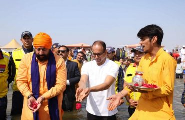 Governor taking a dip at the holy divine Triveni Sangam at Mahakumbh 2025.