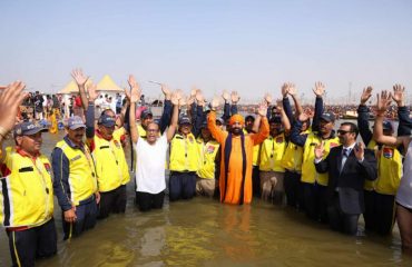 Governor taking a dip at the holy divine Triveni Sangam at Mahakumbh 2025.