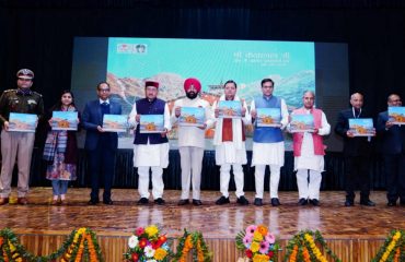 Governor and Chief Minister launching the coffee table book 'Another effort on disaster management in Shri Kedarnath Ji area' prepared by the State Disaster Management Authority.