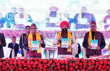 Governor releasing the Progress Report 2023-24 of Uttarakhand Ayurveda University.