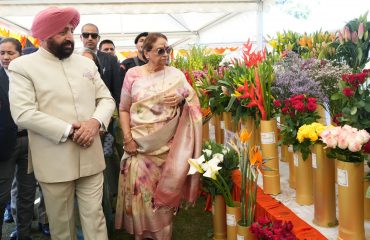 Governor observing the exhibition organised during ‘Vasantotsav-2025’ at Raj Bhawan.