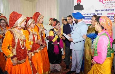 Folk artist Hema Negi meeting the Governor on the occasion of cultural evening program.
