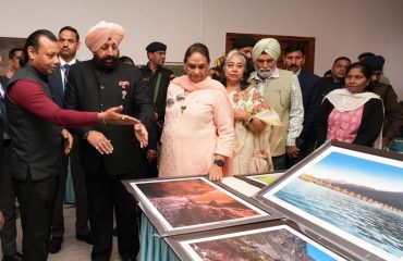 Governor visiting the art gallery and photo exhibition set up during Vasantotsav at Raj Bhawan.