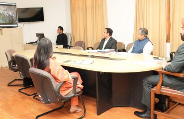 Vice Chancellor Prof. Parvinder Kaushal giving a presentation on the progress of research being done under 