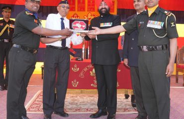 Governor presenting mementoes to the officers of the battalion on the Platinum Jubilee celebrations of 14 Dogra Battalion.