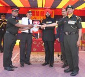 Governor presenting mementoes to the officers of the battalion on the Platinum Jubilee celebrations of 14 Dogra Battalion.;?>