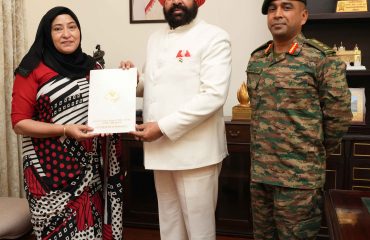 The Governor being apprised by the Vice President of the Management Committee of 'Golden Ki Asha School' Colonel Yogesh Upadhyay and Principal Samra Mirza.