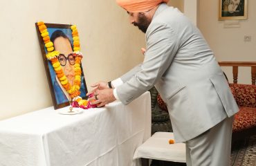 The Governor paying emotional homage to Bharat Ratna Dr. Bhimrao Ambedkar by laying floral wreath on his portrait on the occasion of his birth anniversary.