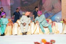 Governor talking to Cabinet Minister Shri Satpal Maharaj on the occasion of 'Goodwill Conference and National Unity Camp' program organized in Haridwar.;?>