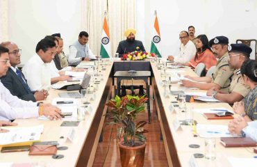 Governor presiding over a meeting with officials regarding the preparations for the Uttarakhand Chardham Yatra at Raj Bhawan.