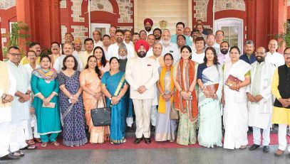 Governor with officials appointed in various departments at Raj Bhawan.