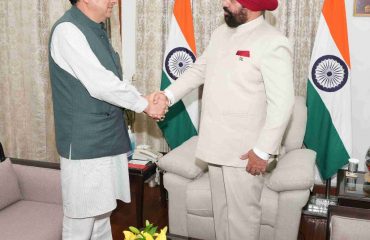 Chief Minister Shri Pushkar Singh Dhami making a courtesy call on the Governor.