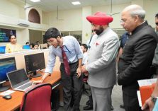 Governor observing the innovative projects of students participating in the Hackathon 