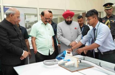 Governor observing the innovative projects of students participating in the Hackathon 