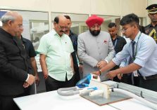 Governor observing the innovative projects of students participating in the Hackathon 