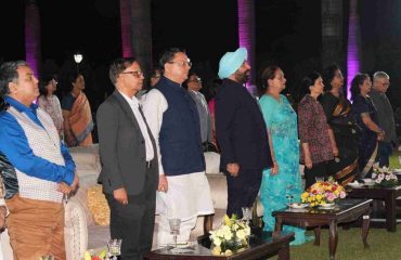 Governor, Chief Minister Shri Pushkar Singh Dhami and Chairman, 16th Finance Commission Dr. Arvind Pangariya participating in the cultural evening program at Raj Bhawan.