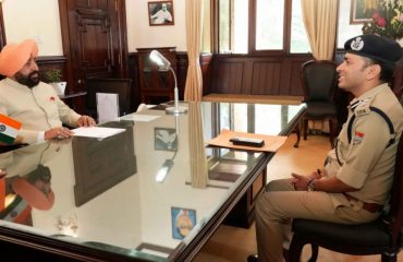 Governor receiving information on security arrangements in the district from SSP P.N. Meena at Raj Bhawan Nainital.