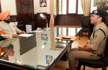 Governor receiving information on security arrangements in the district from SSP P.N. Meena at Raj Bhawan Nainital.