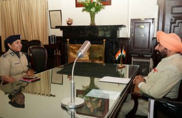 Governor receiving information on law and order and traffic management from IG Kumaon Zone Riddhim Aggarwal at Raj Bhawan Nainital.