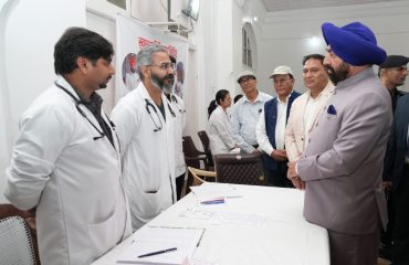 Governor inspecting the one-day special medical camp organized at Raj Bhawan Nainital and getting information about health check-up from the doctors.