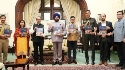 The Governor releasing the magazine "Devbhoomi Samvad" of Raj Bhawan Uttarakhand.