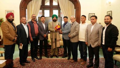 Officials of the Hotel Association, Nainital with the Governor.