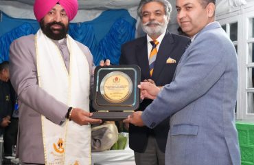 Governor felicitating teachers who have rendered uninterrupted services for decades at Sherwood College, Nainital.