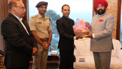 District Magistrate Ashish Bhatgain welcoming the Governor on his arrival at the guest house of Kumaon Mandal Vikas Nigam in Kausani.