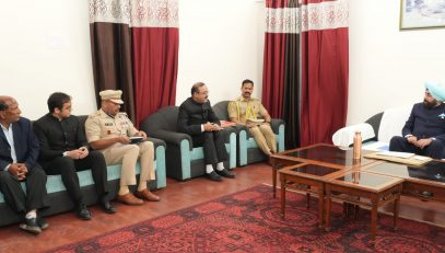 Governor holding a meeting with senior officials of the district administration at the Circuit House in Almora.