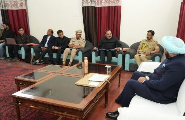 Governor holding a meeting with senior officials of the district administration at the Circuit House in Almora.