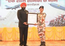 Governor felicitating soldiers at the program 