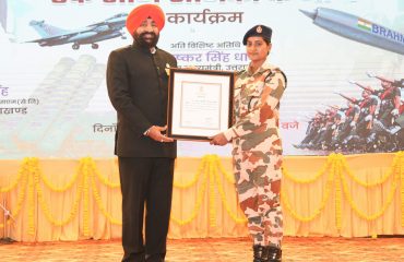 Governor felicitating soldiers at the program 