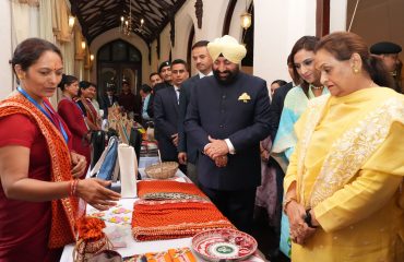 Governor observing the product exhibition organized by women self-help groups at Raj Bhawan Nainital.
