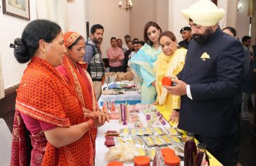 Governor observing the product exhibition organized by women self-help groups at Raj Bhawan Nainital.
