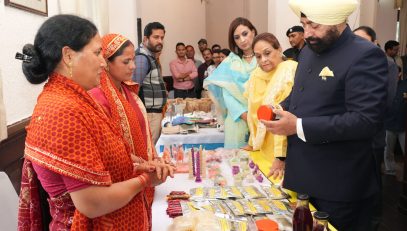 Governor observing the product exhibition organized by women self-help groups at Raj Bhawan Nainital.