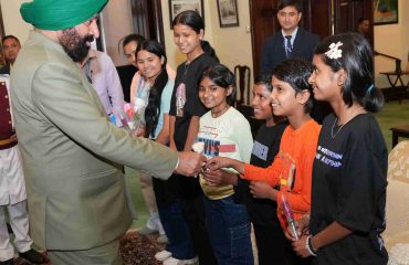 Governor meeting the children of SOS Bal Gram, Bhimtal at Raj Bhawan.