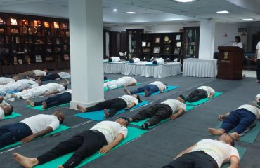 Rajbhawan officers and employees practicing yoga on the occasion of International Yoga Day at Rajbhawan.