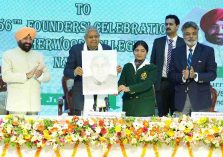Sherwood College student presenting a sketch to the Vice President.;?>
