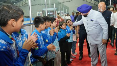 Governor meeting children on the occasion of closing of 20th National Short Track Speed Skating Championship and inauguration of Ice Figure Skating National Championship-2025 in Dehradun.