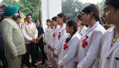Governor interacting with volunteers of Red Cross Committee in Raj Bhawan premises.