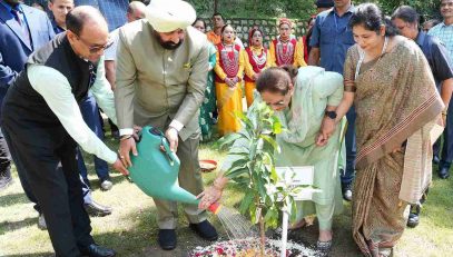 Governor and First Lady Smt. Gurmeet Kaur planting a sapling in the Raj Bhawan campus on the occasion of Harela festival.