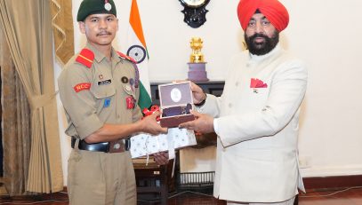 Governor honoring NCC cadets who conquered Mount Everest at a program organized at Raj Bhawan.