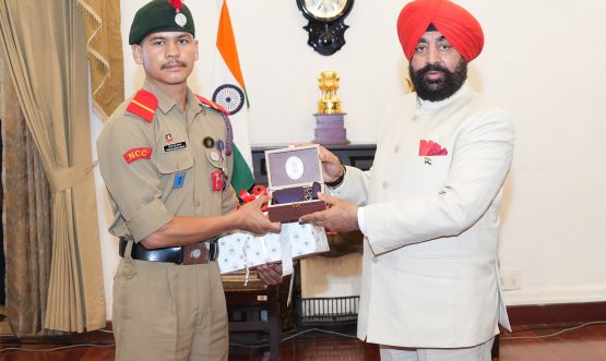 Governor honoring NCC cadets who conquered Mount Everest at a program organized at Raj Bhawan.